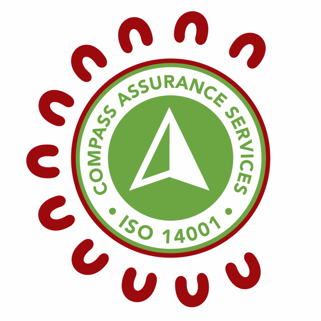 Compass Assurance Services ISO 14001 certification badge featuring a circular green seal with a white compass arrow emblem, surrounded by the SCS Indigenous decorative red circular border of repeating U-shaped symbols inspired by Aboriginal art motifs, on a white background.