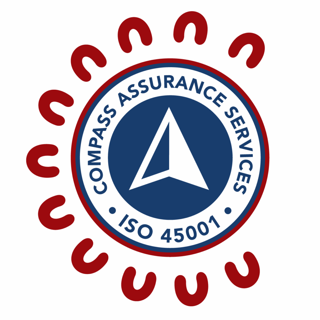 ISO 45001 certification badge for Compass Assurance Services, featuring a white compass icon on a blue circle, surrounded by red and blue text rings, with a boomerang motif border, on a white background