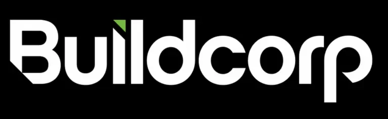 Buildcorp company logo on a black background, featuring the word "Buildcorp" in bold white sans-serif lettering with a small green geometric accent shape above the letter "i".